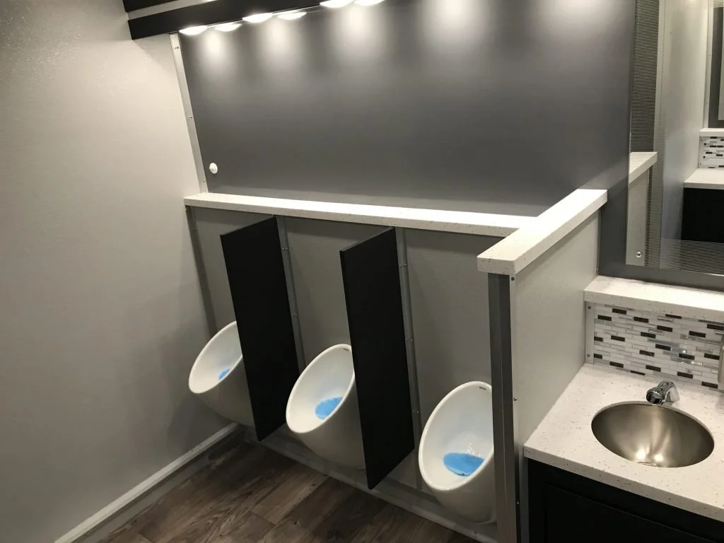 Interior of luxury restroom trailer mens room