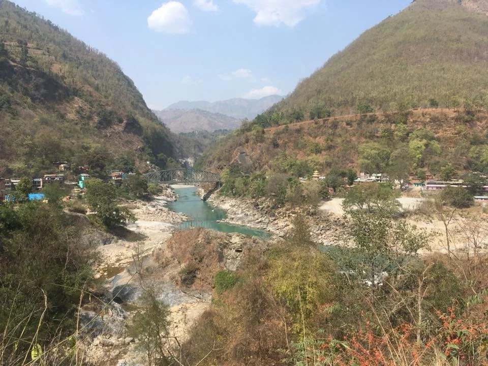 Nepal bridge river.jpg