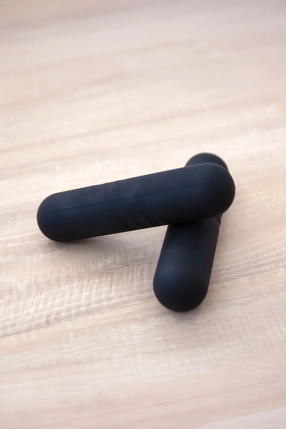 Pair of black silicon coated hand weights.