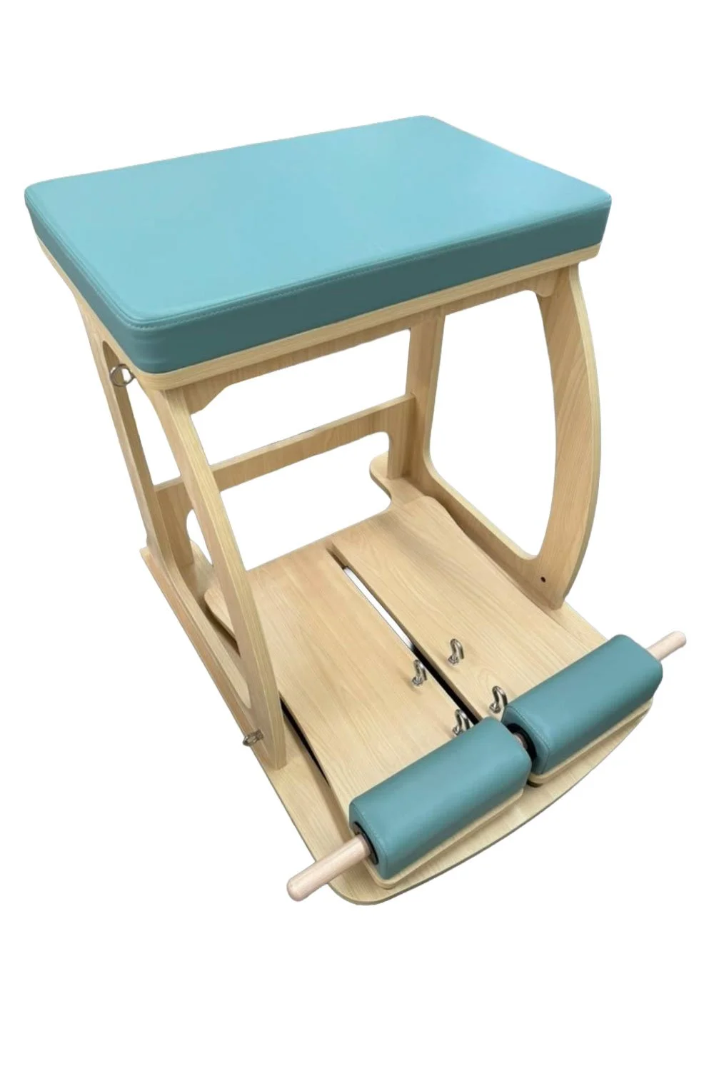 Split Pedal Wunda Chair with teal upholstery, showing the split pedals and compact timber frame