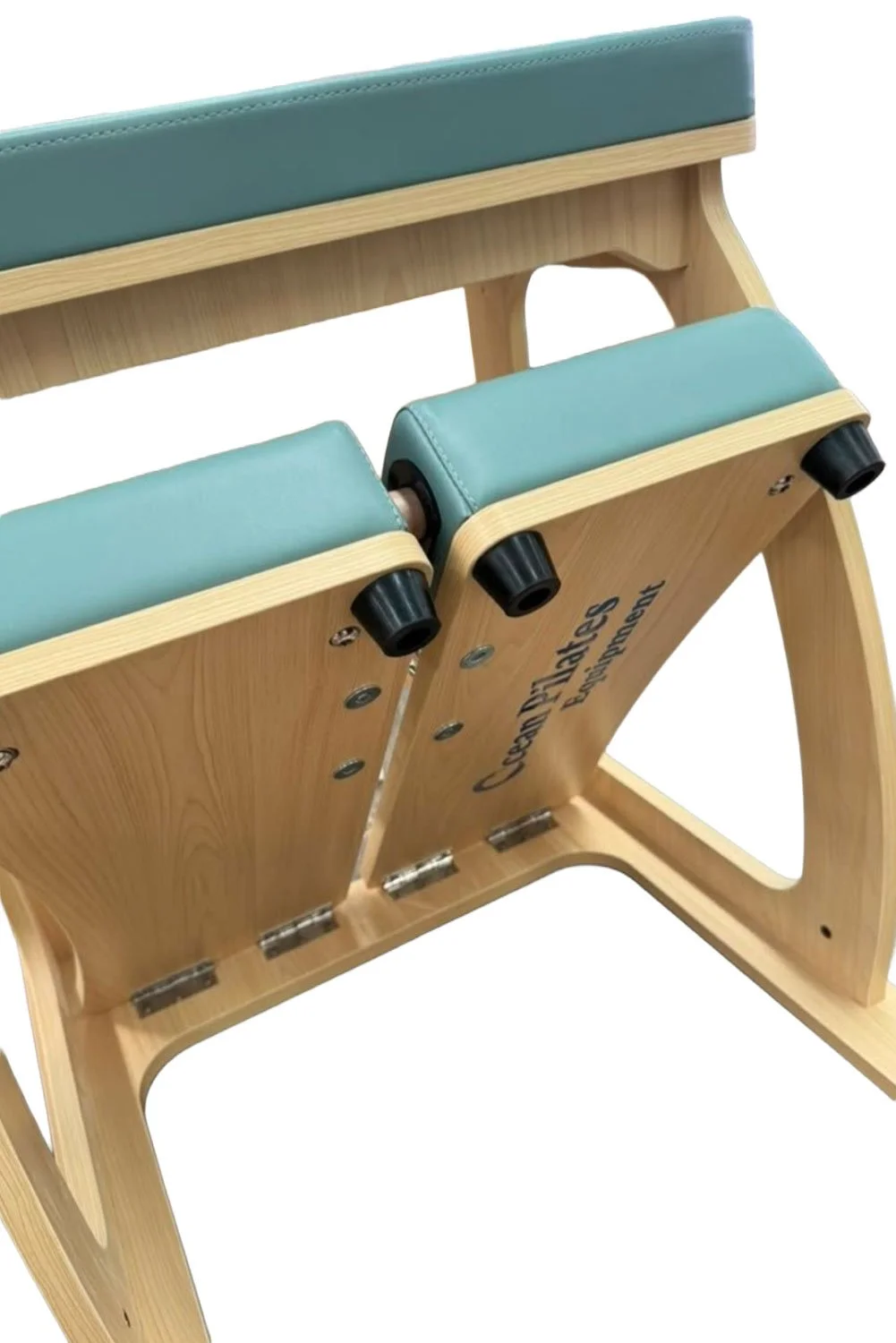 Close-up of Split Pedal Wunda Chair showing the two independently moving padded pedals and attachment points