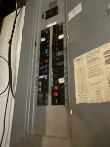 Electrical panel connection for a new condenser circuit in Natick, MA completed by Innis Electric on September 11, 2026.