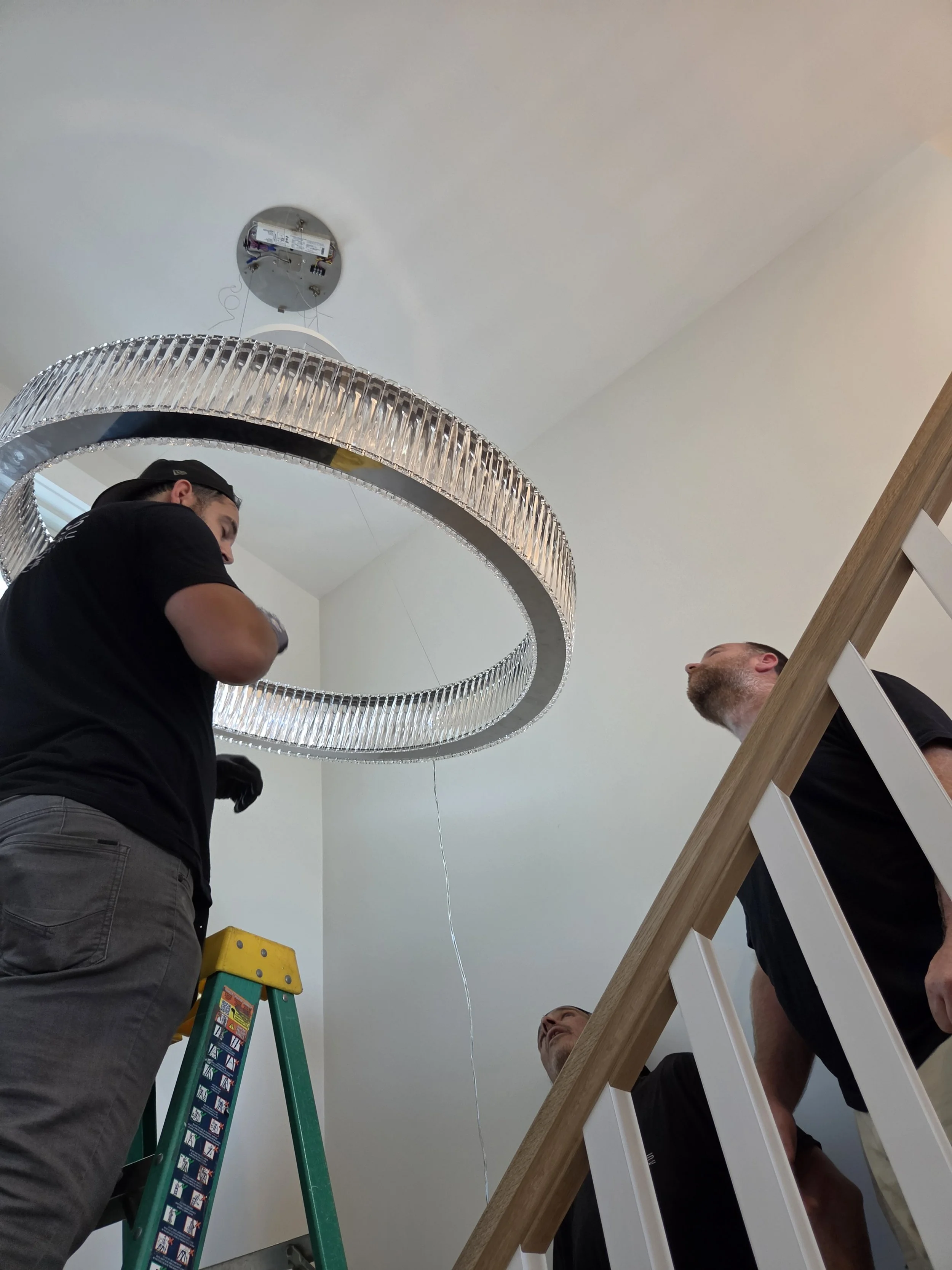 07-chandelier-installation-close-up.jpg