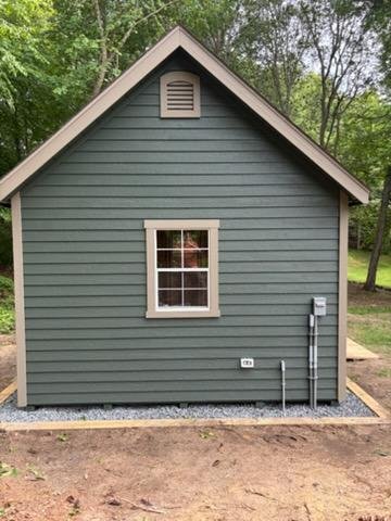 31-shed-side-exterior-service-wiring.jpg