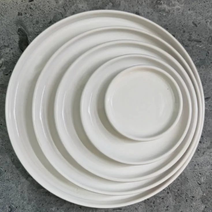 Stackable design &bull; creamy white plates &bull; set for any occasion 

#olivetceramics #ceramicplates #sonomacounty