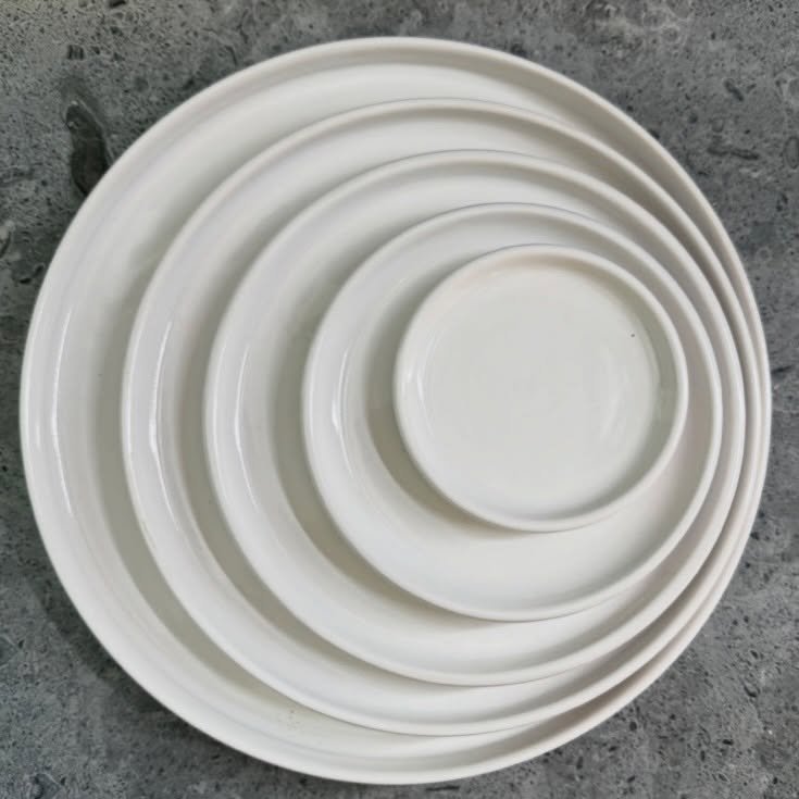 Stackable design &bull; creamy white plates &bull; set for any occasion 

#olivetceramics #ceramicplates #sonomacounty