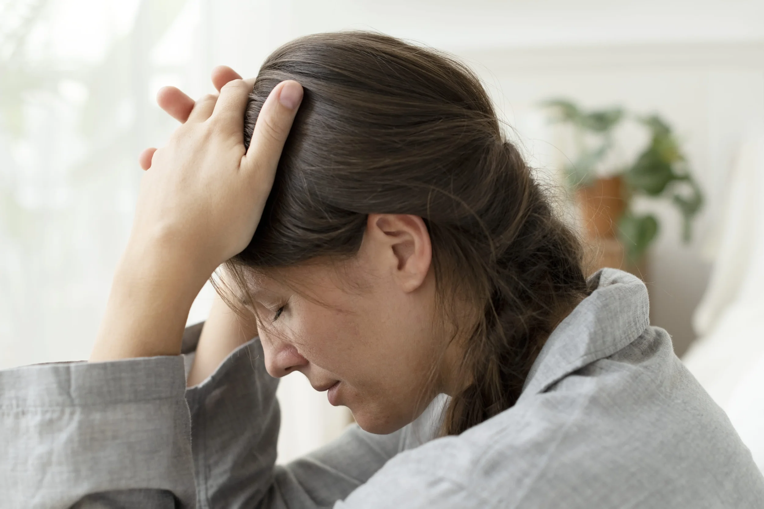 A woman experiencing high-functioning anxiety - Integrative Healthcare Alliance
