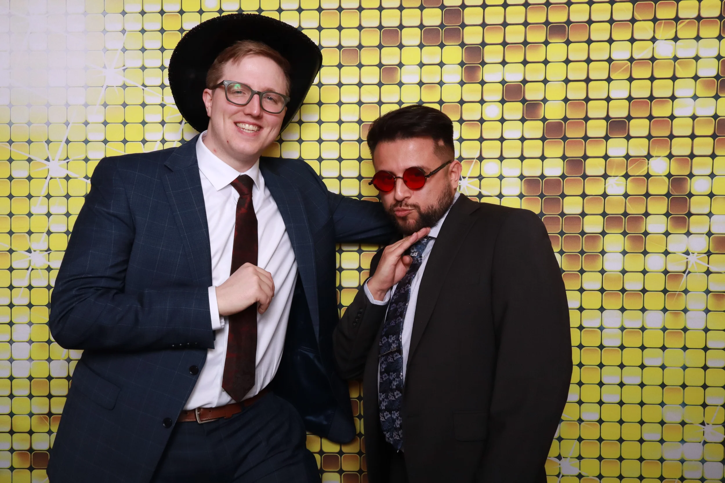 two friends posing in riverside photo booth by hivequarter co