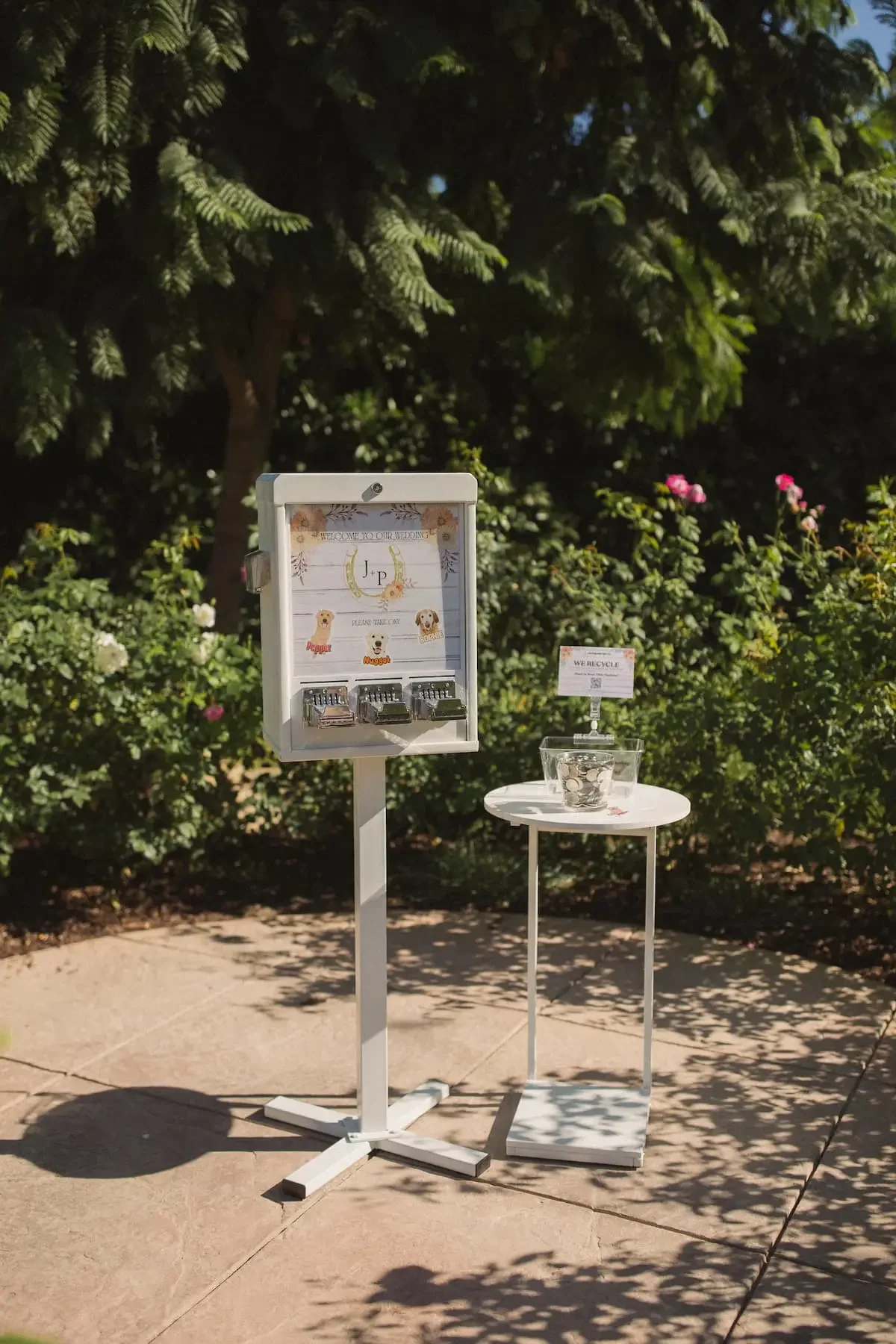sticker vending machine in the forest at a wedding