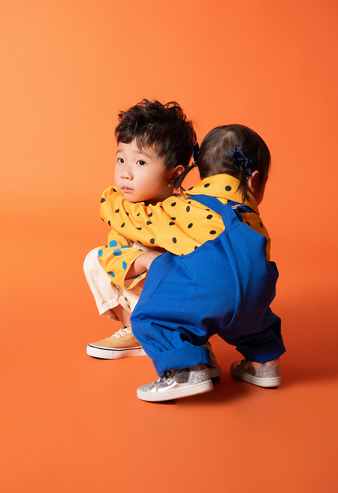 High-end children’s portrait with classic wooden backdrop in Flushing studio