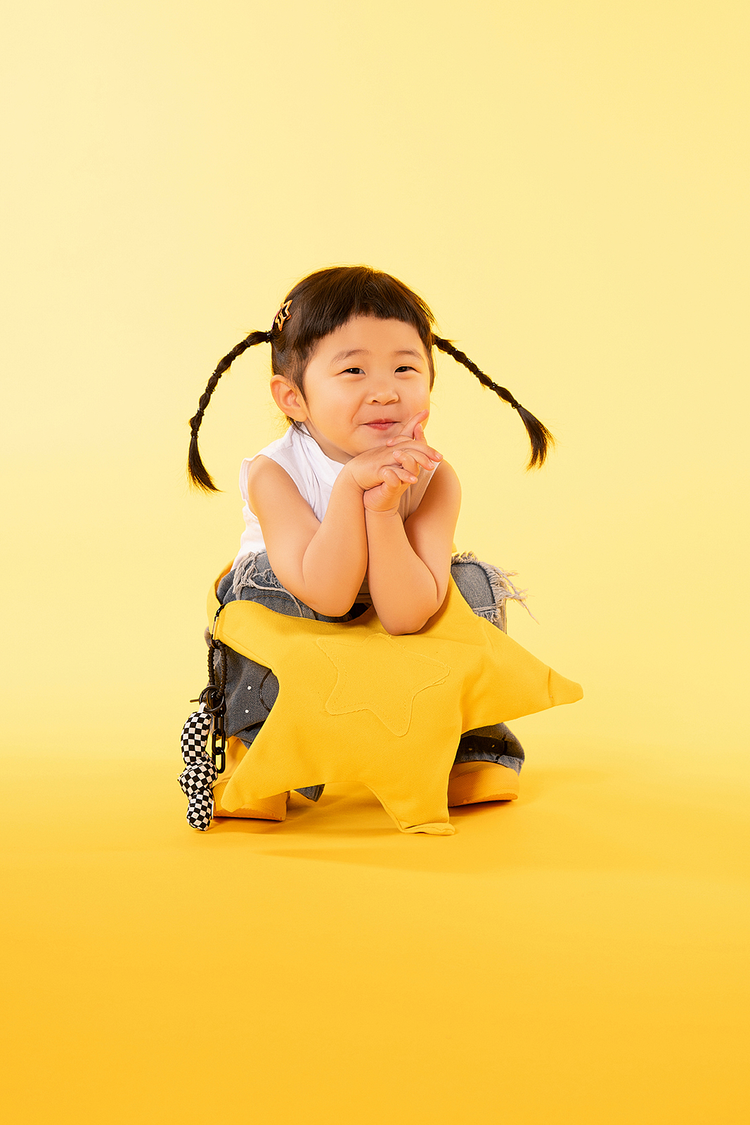 Boy wearing denim jacket in casual high-end children’s photoshoot, NYC