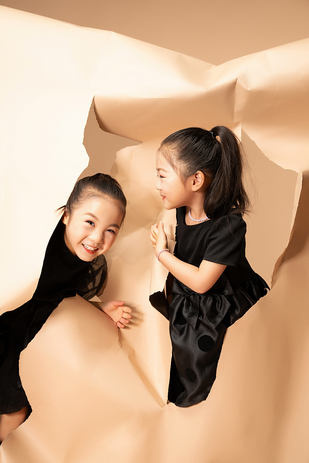 Elegant children’s black-and-white portrait in New York photography studio
