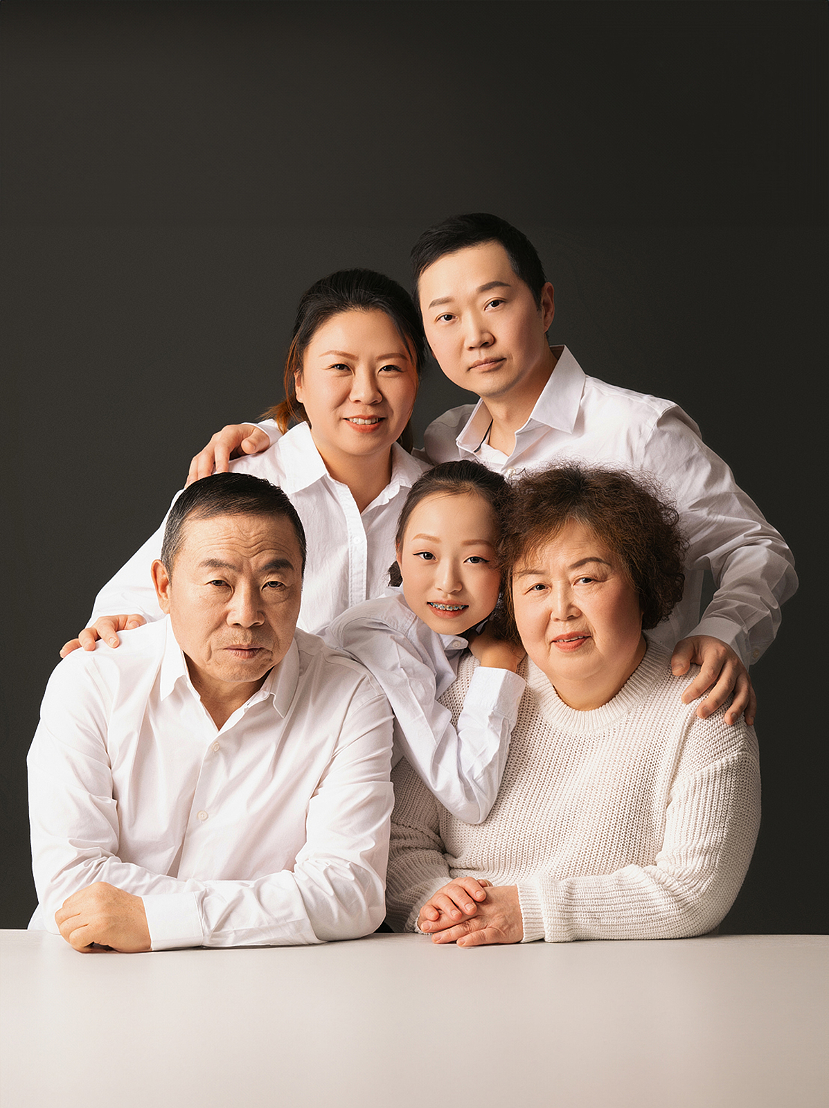Stylish family portrait with natural lighting in Flushing photography studio