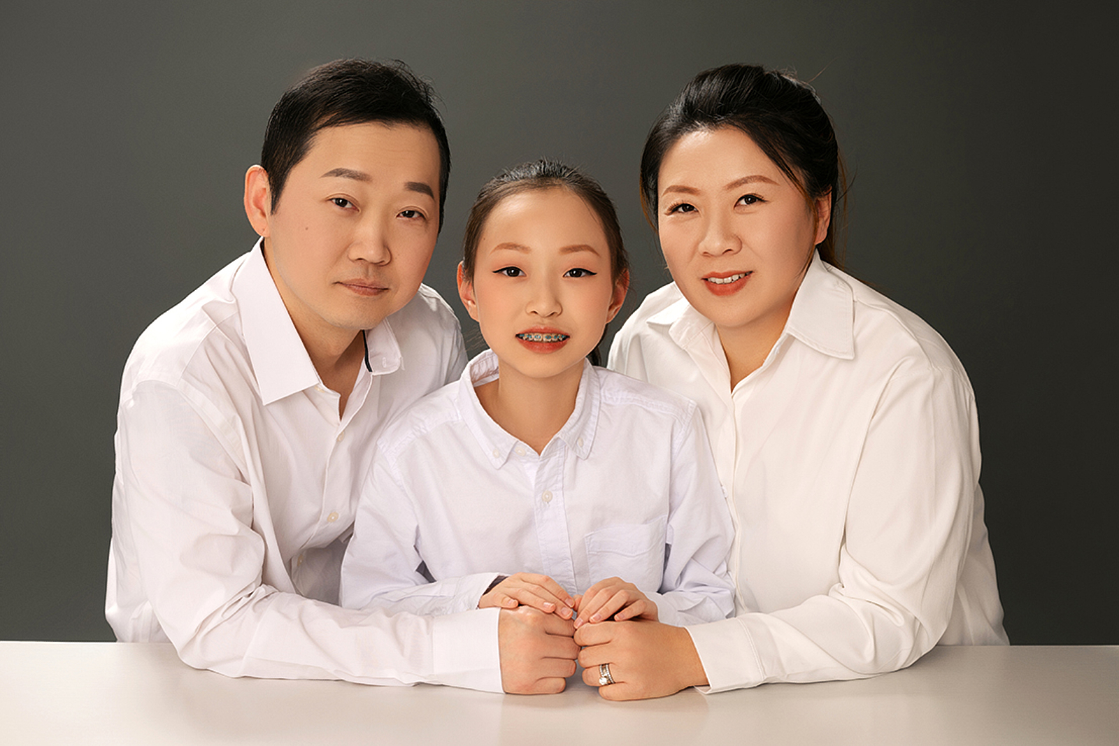 High-end outdoor family portrait during sunset in Queens