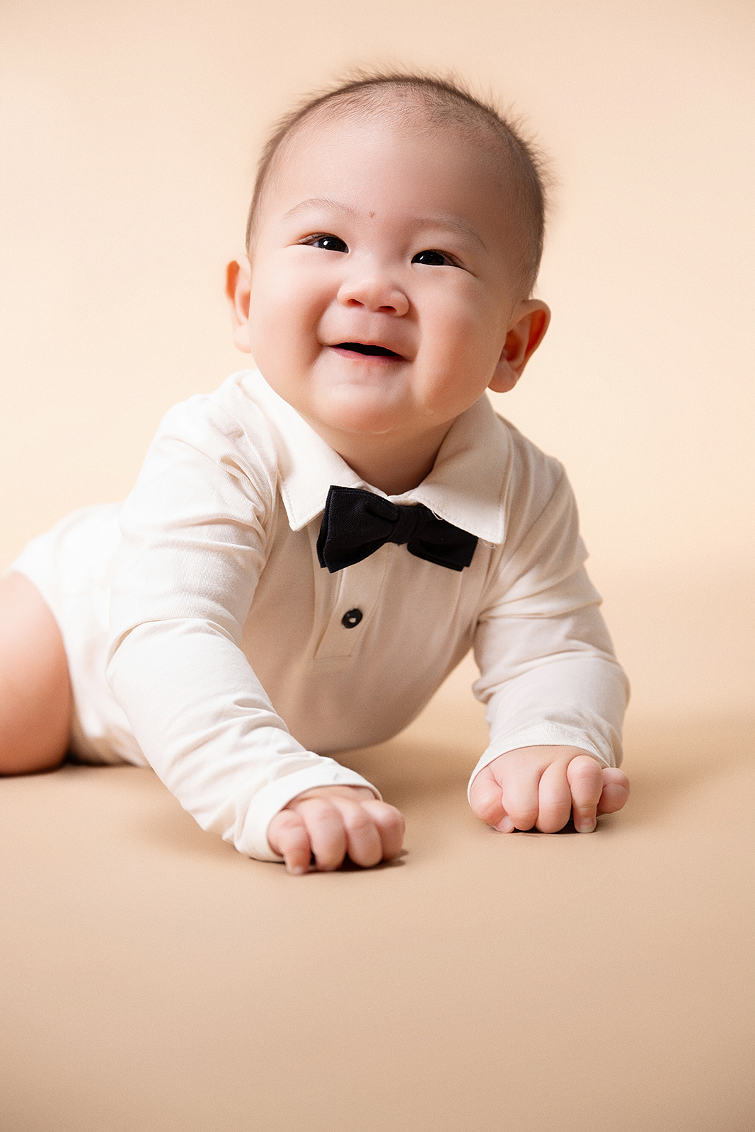 Candid children’s portrait with laughing expression in Flushing, NYC