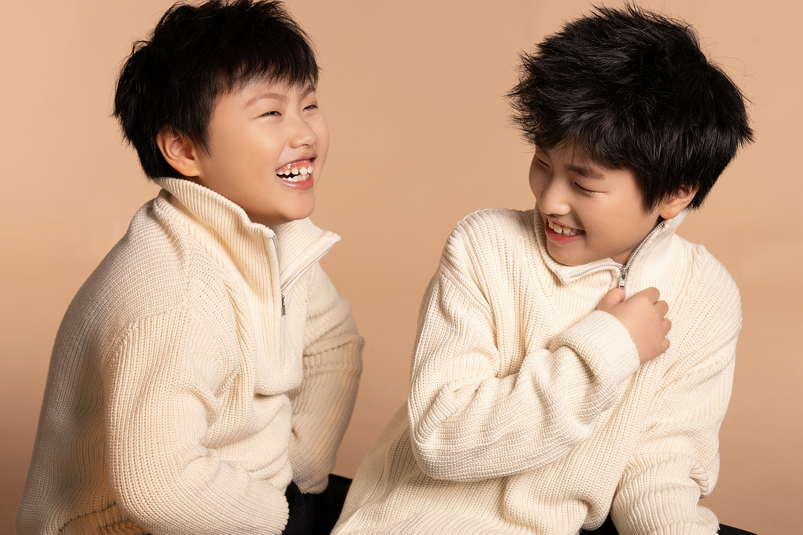 Editorial children’s portrait with vintage chair prop in Queens, NY
