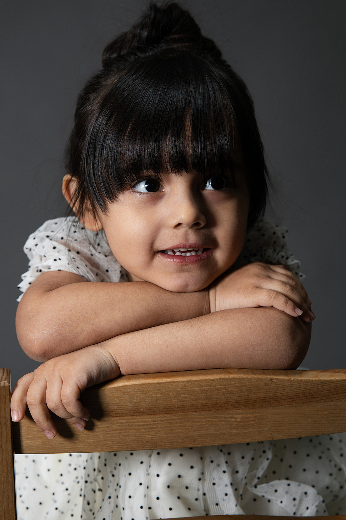 Playful candid children’s photo in high-end Flushing portrait studio