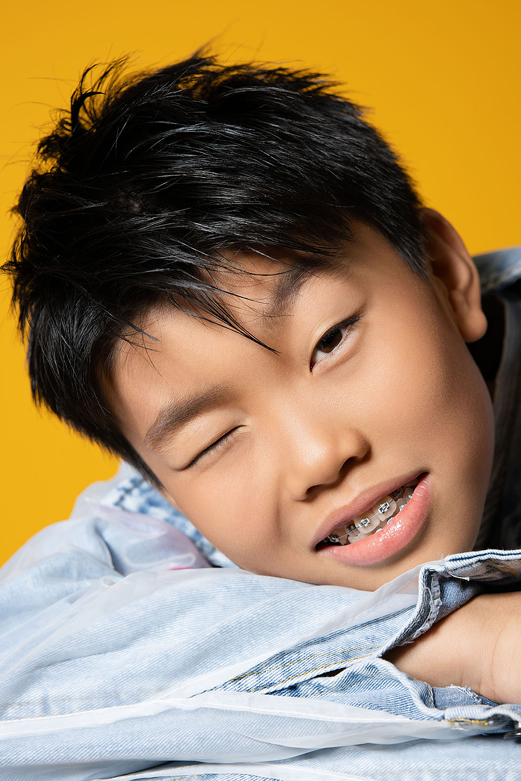 Smiling boy in sailor shirt during outdoor shoot in Manhattan