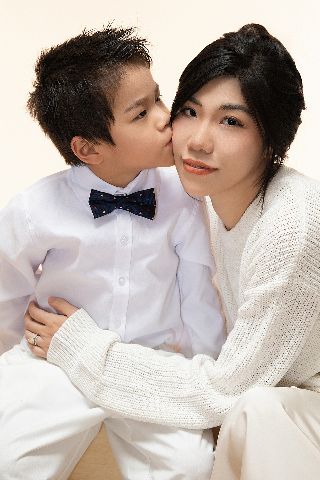 Multi-generational family photo in high-end NYC photography studio