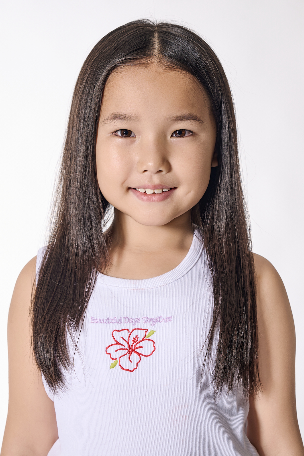 NYC child actor headshot - happy boy portrait on white background