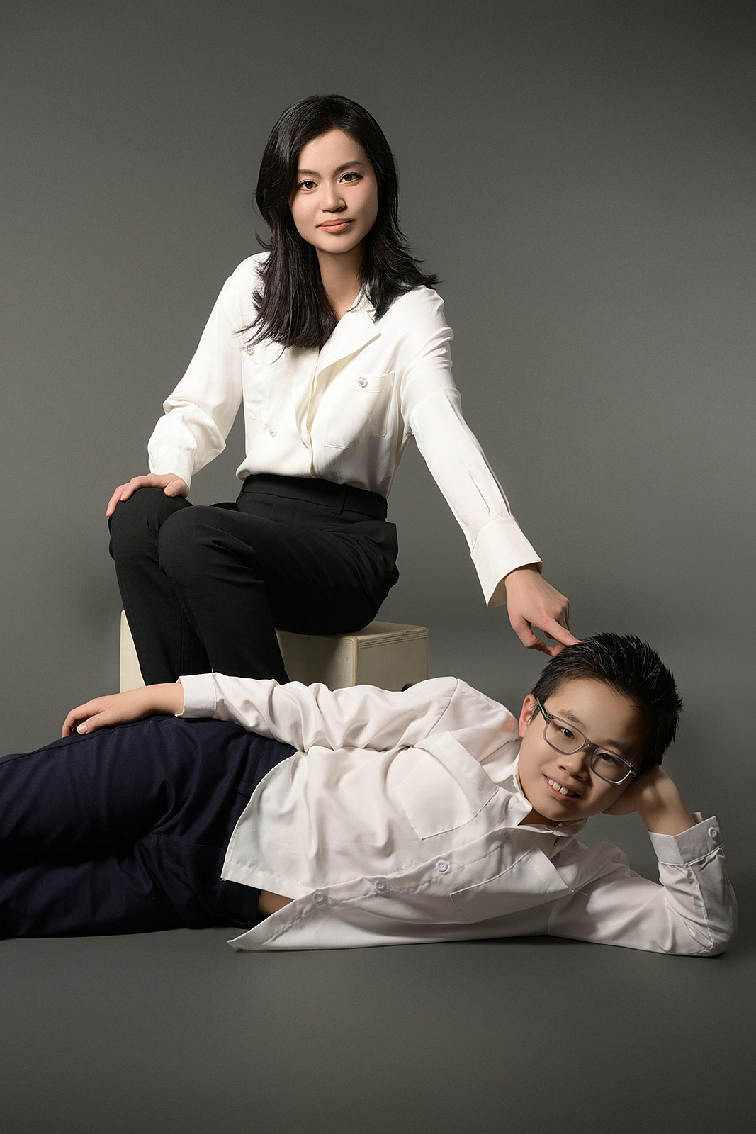 Candid family moment captured in high-end Flushing photography studio