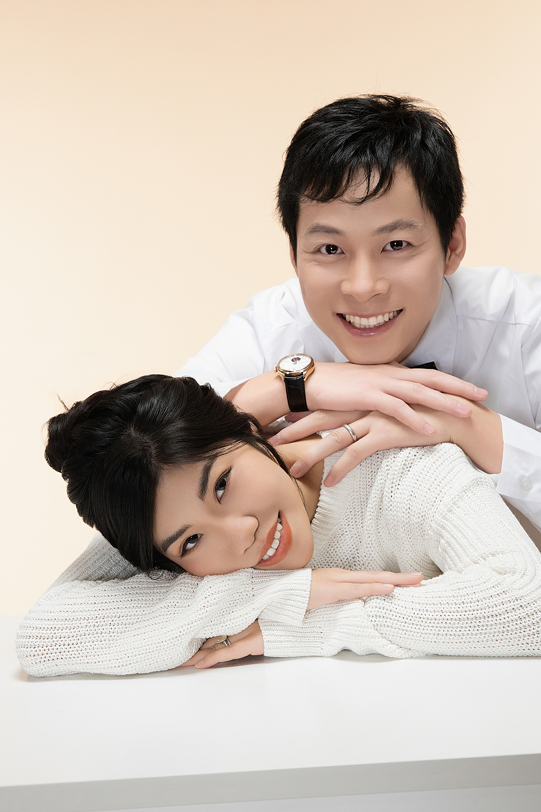 High-end family portrait with dramatic lighting in Flushing studio
