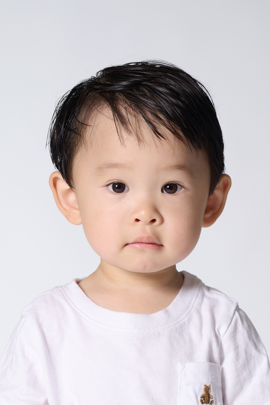 NYC child casting portrait - confident young model headshot