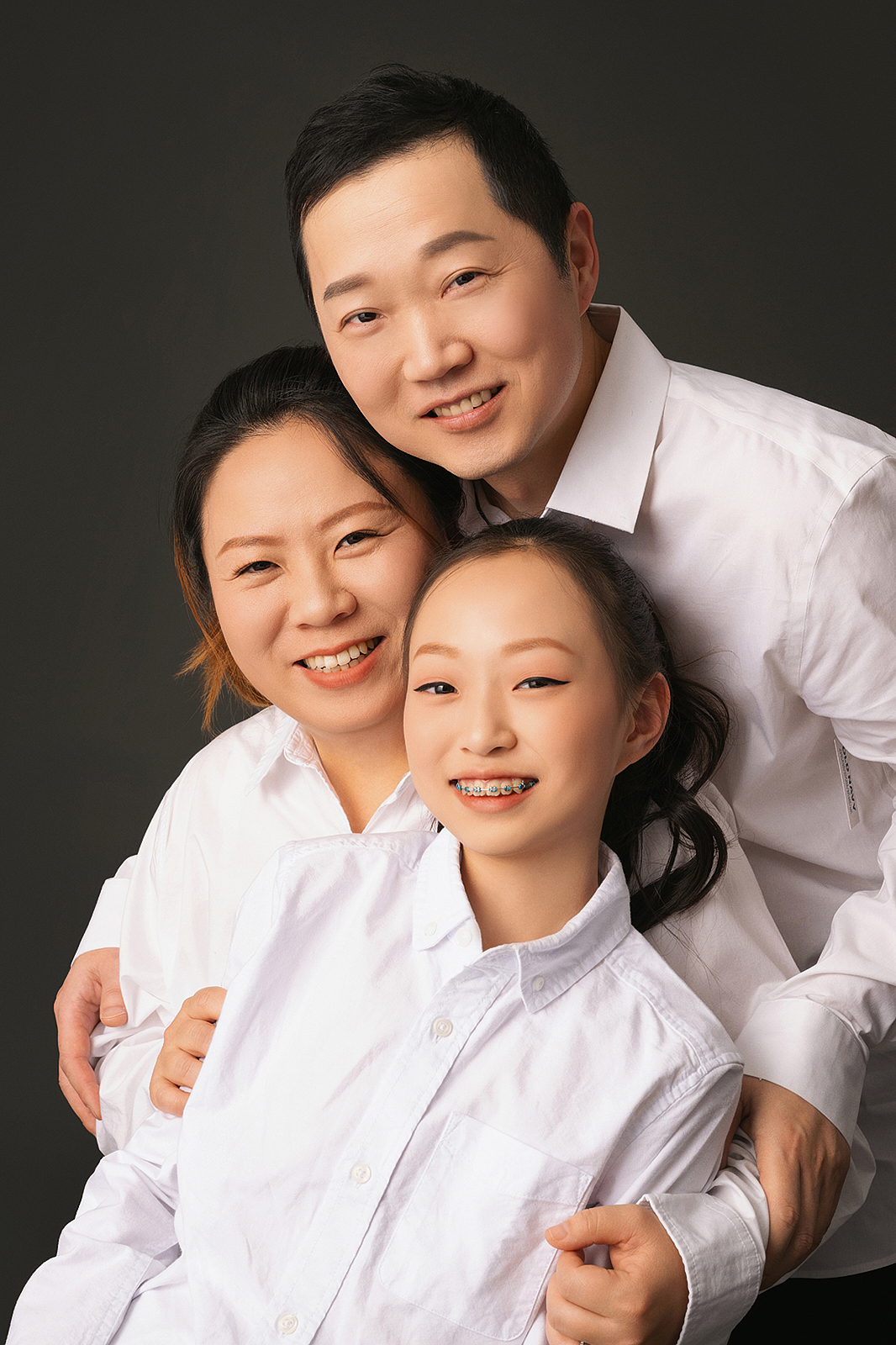 Elegant family portrait with traditional Chinese attire in Queens
