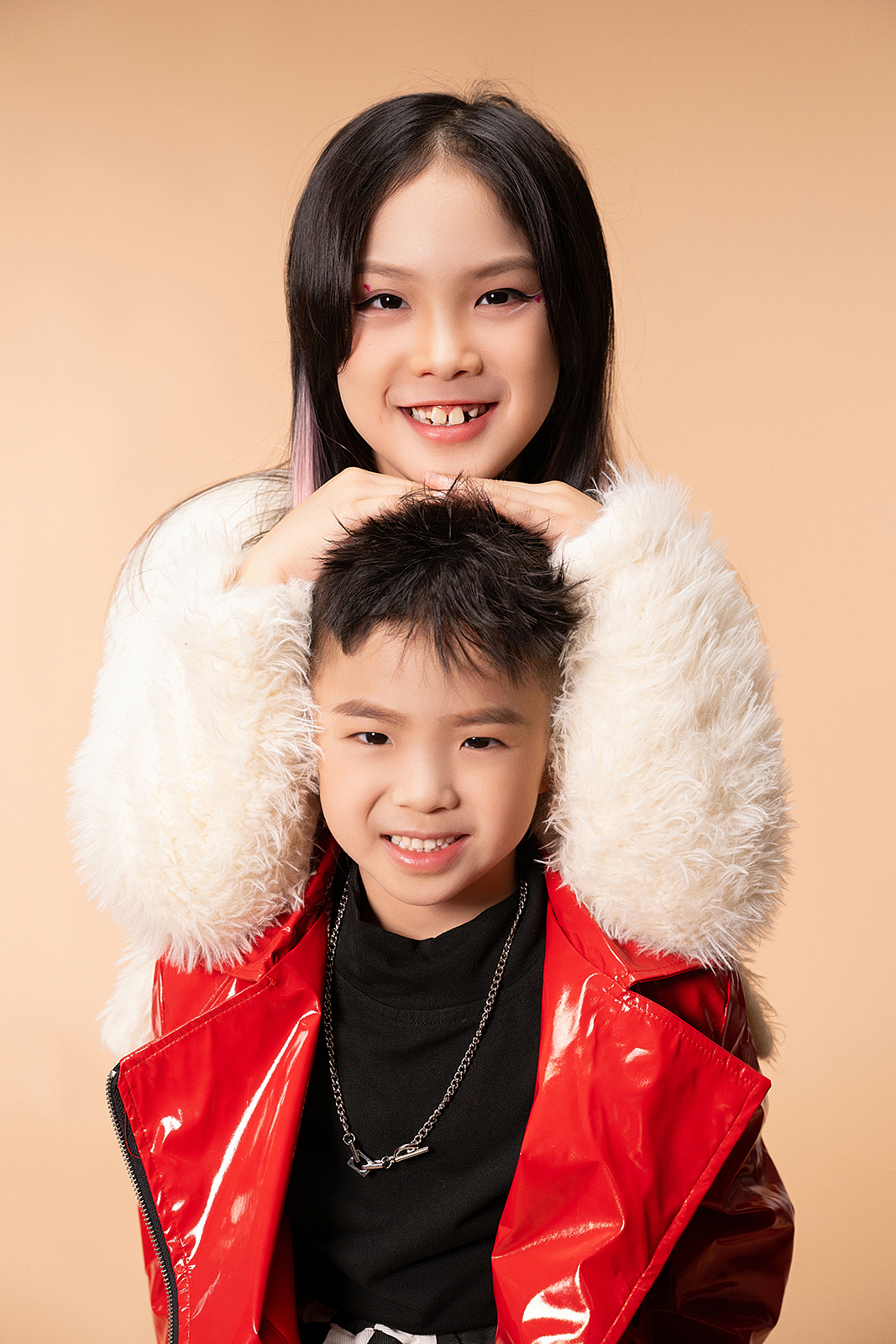 Girl in sparkly dress during high-end studio photoshoot in Flushing