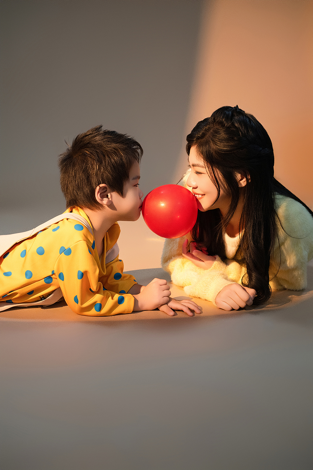 High-end studio portrait of parents with newborn in Flushing