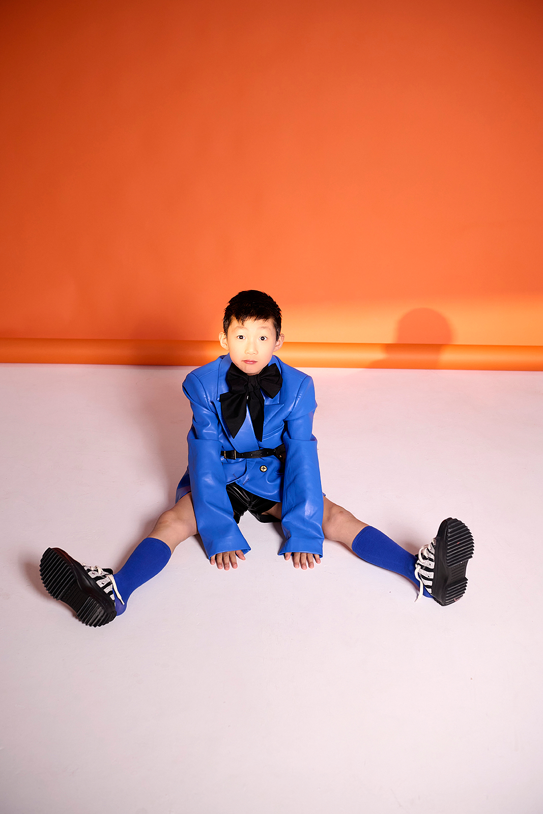 ashion-inspired children’s portrait with dramatic lighting in Queens, NY