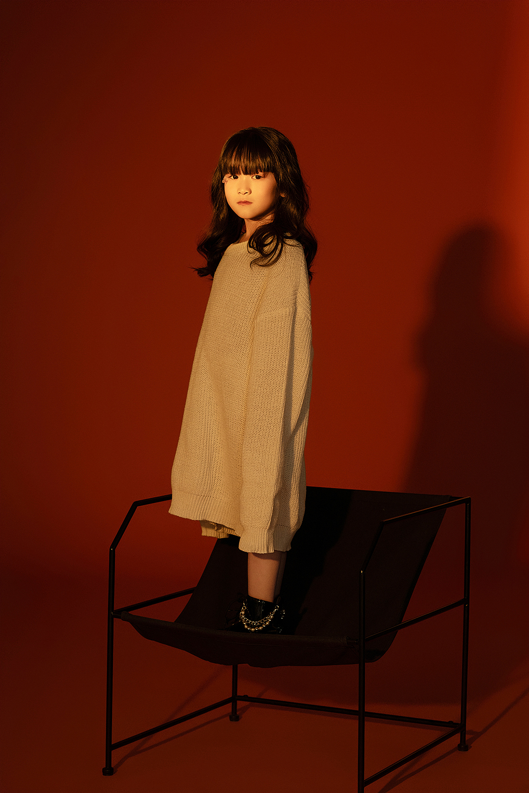Elegant children’s portrait in natural window light in Queens photography studio