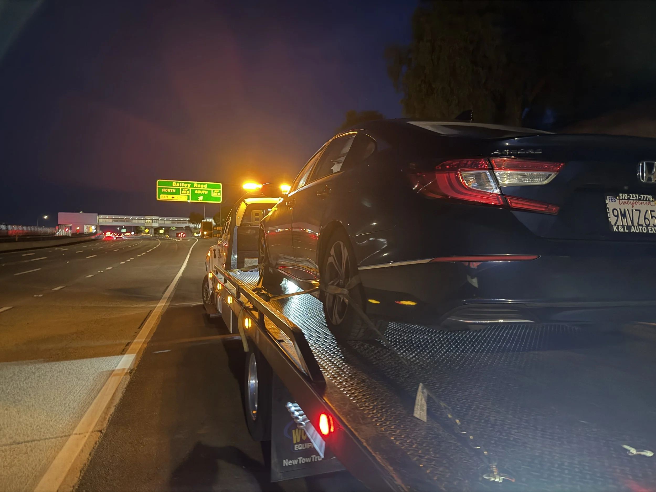 Honda Accord being transported by 24-7 Rescue Towing near Bailey Road and Highway 4 in Bay Point CA