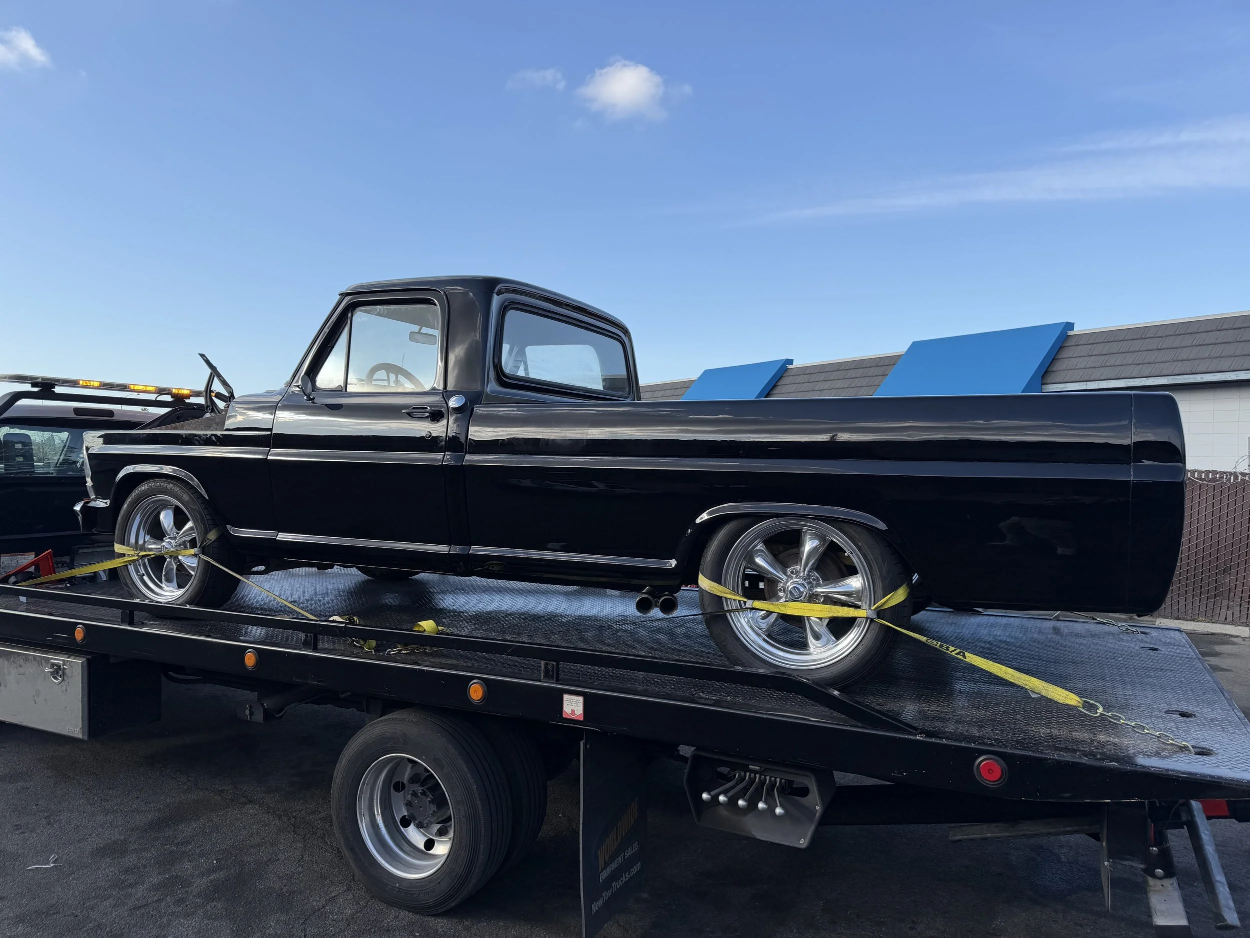 Classic truck transport on flatbed tow truck in Antioch California