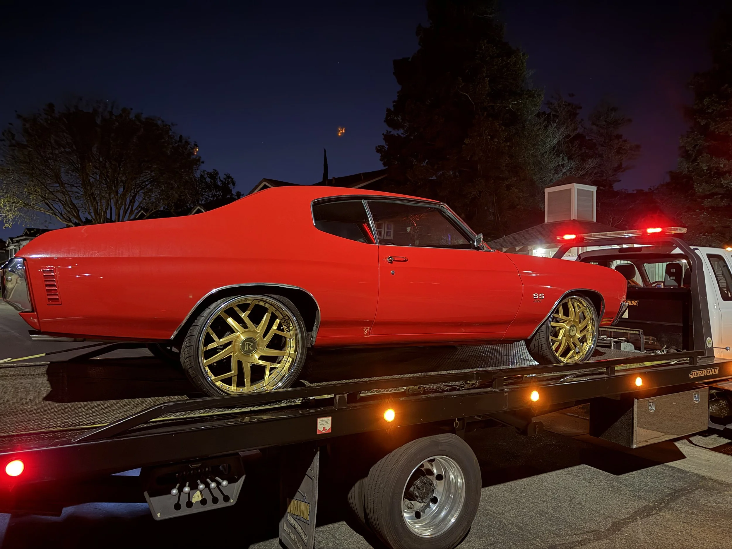 Classic Chevrolet Chevelle SS transported by 24-7 Rescue Towing flatbed service in Bay Point California