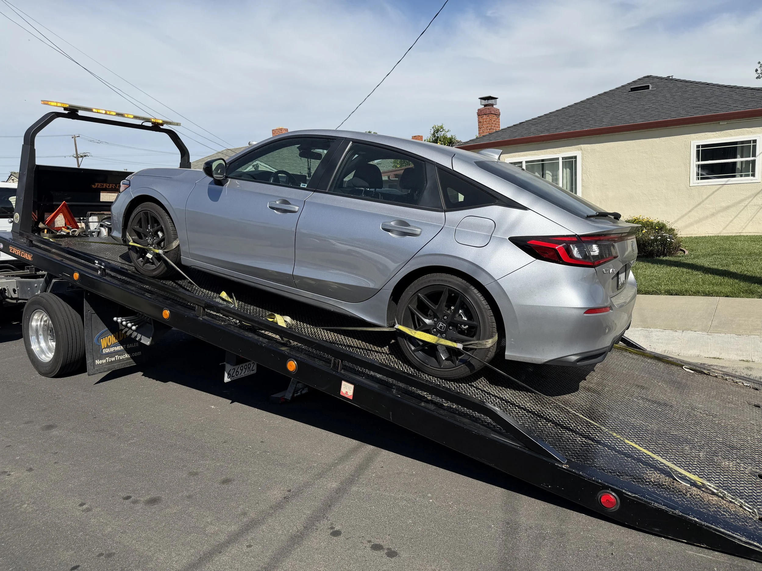 Silver sedan towing and roadside assistance in Pittsburg CA