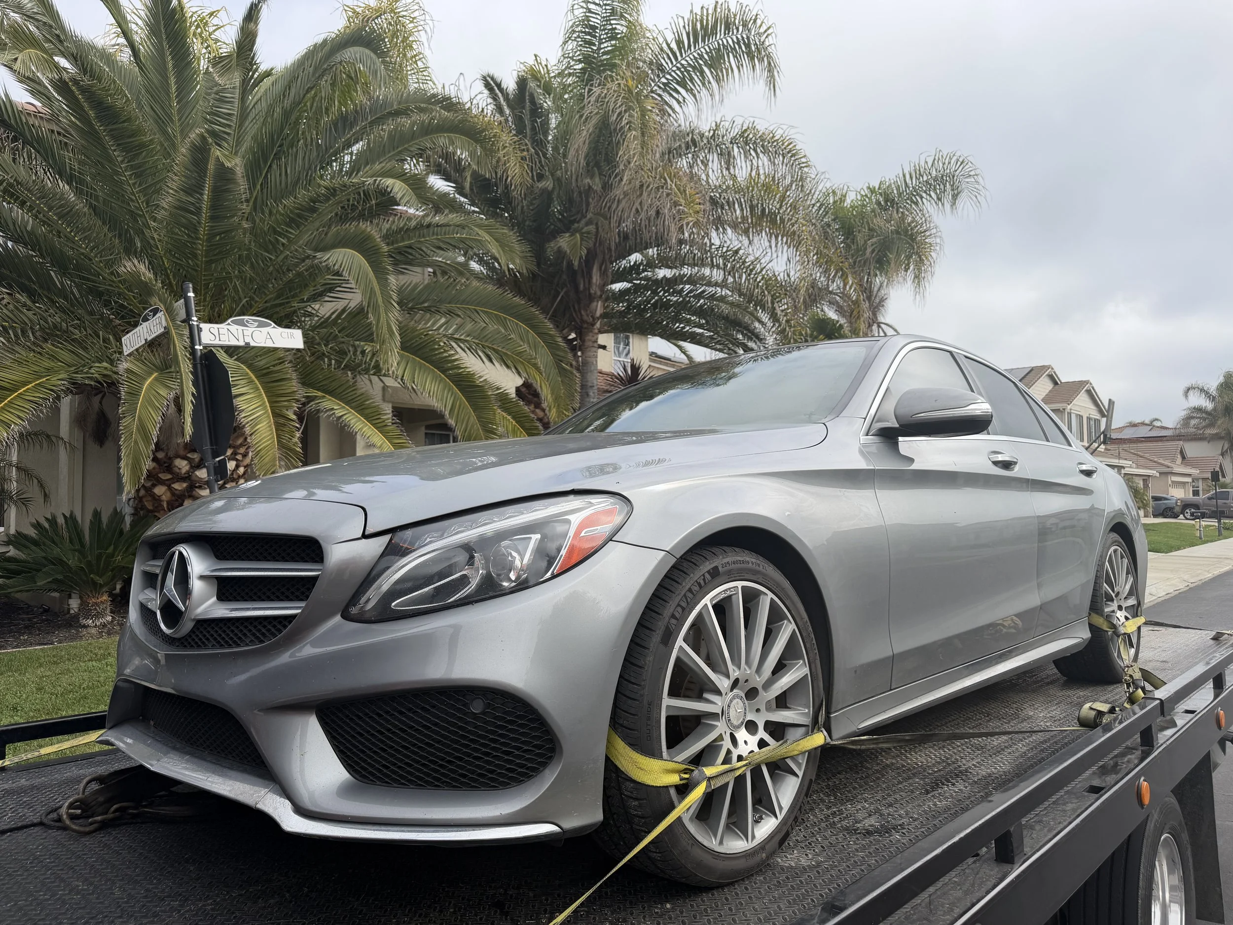 24-7 Rescue Towing transporting a Mercedes Benz in Discovery Bay near Seneca Circle and South Lakefront Loop