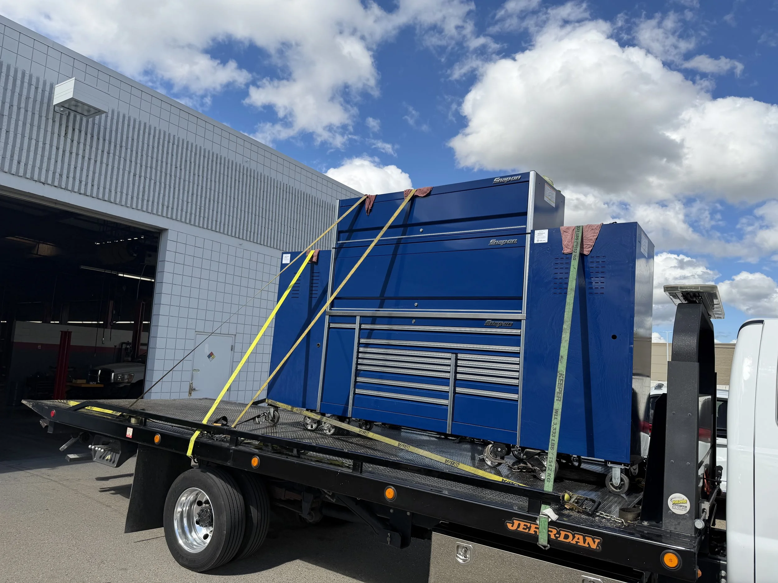 Snap-on toolbox transported on a flatbed tow truck by 24-7 Rescue Towing in Antioch CA.