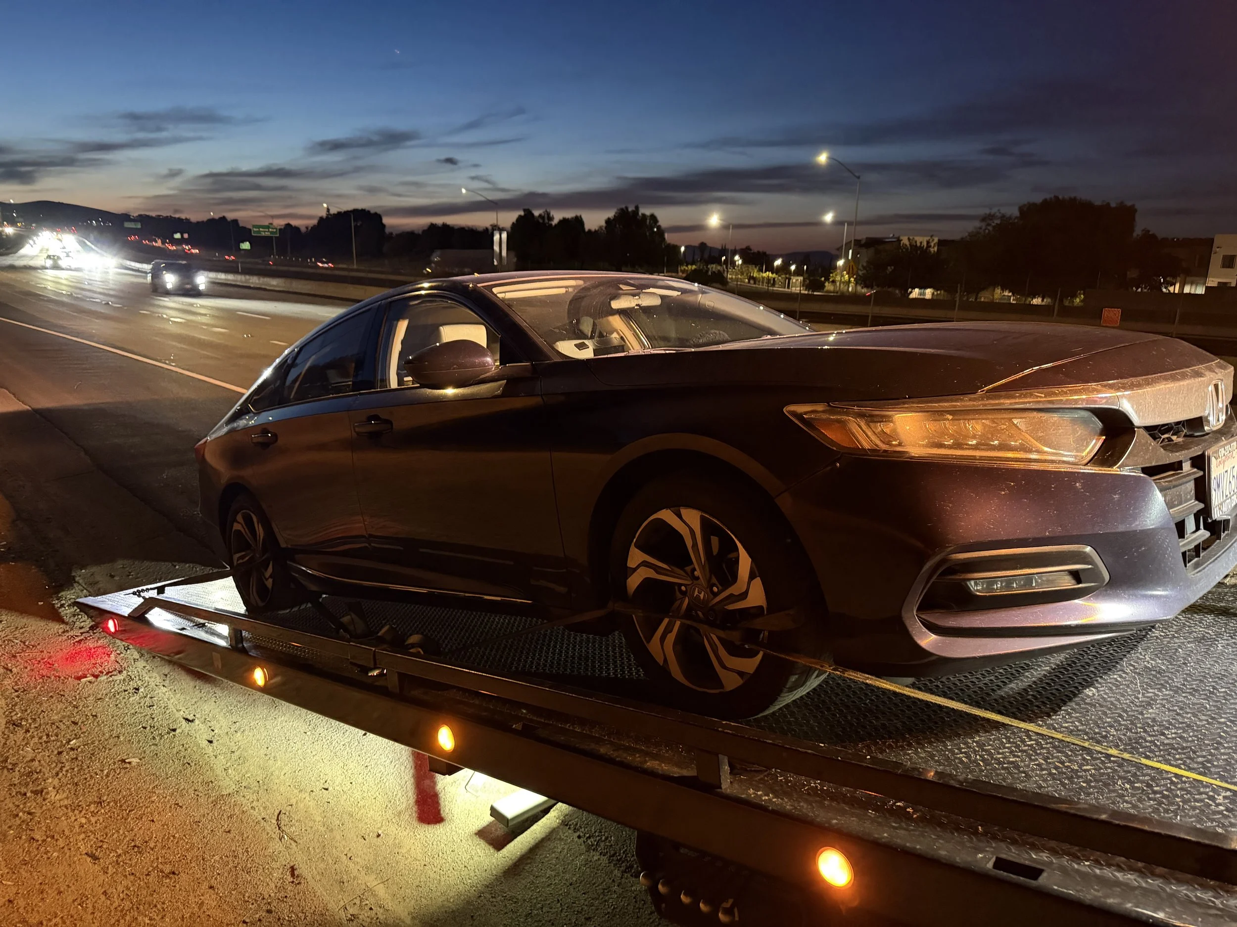 Honda Accord being transported by 24-7 Rescue Towing near Highway 4 and Bay Point BART in Bay Point CA