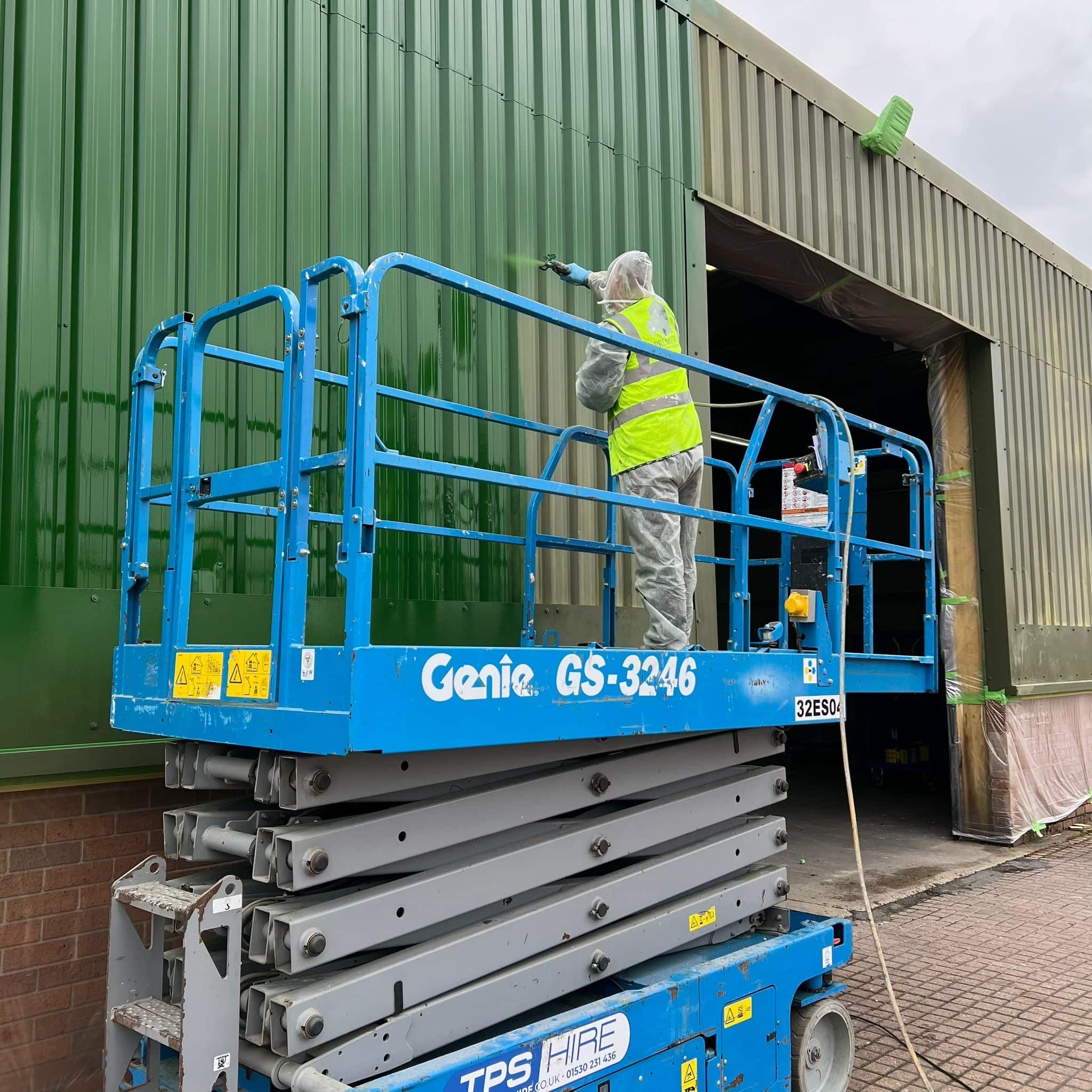 Expert spray application of durable coatings on industrial cladding during respray project in Burton-on-Trent