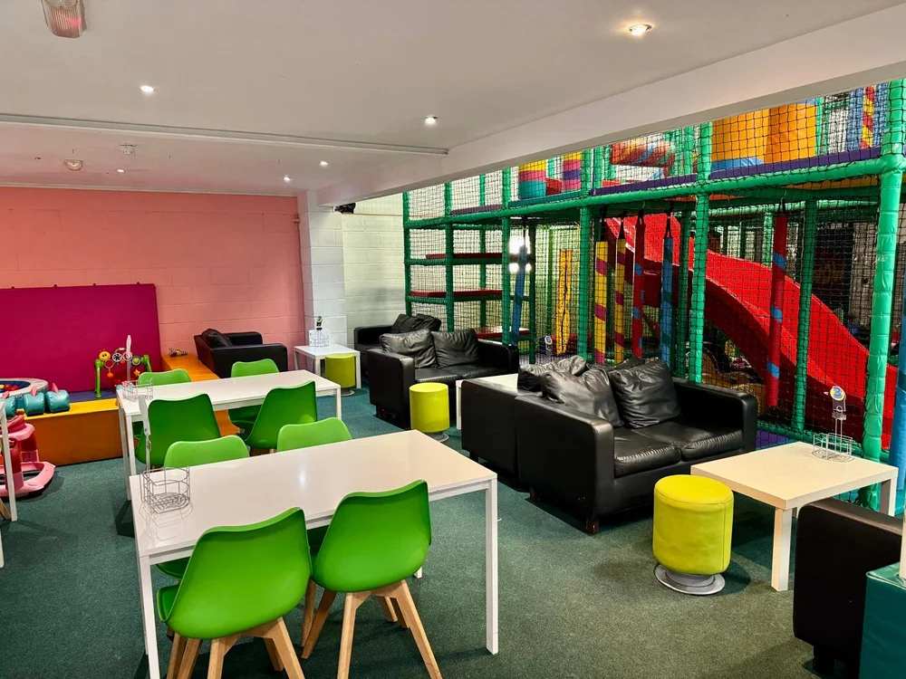 Diddy Middy's café tables and comfortable seating beside the soft play area