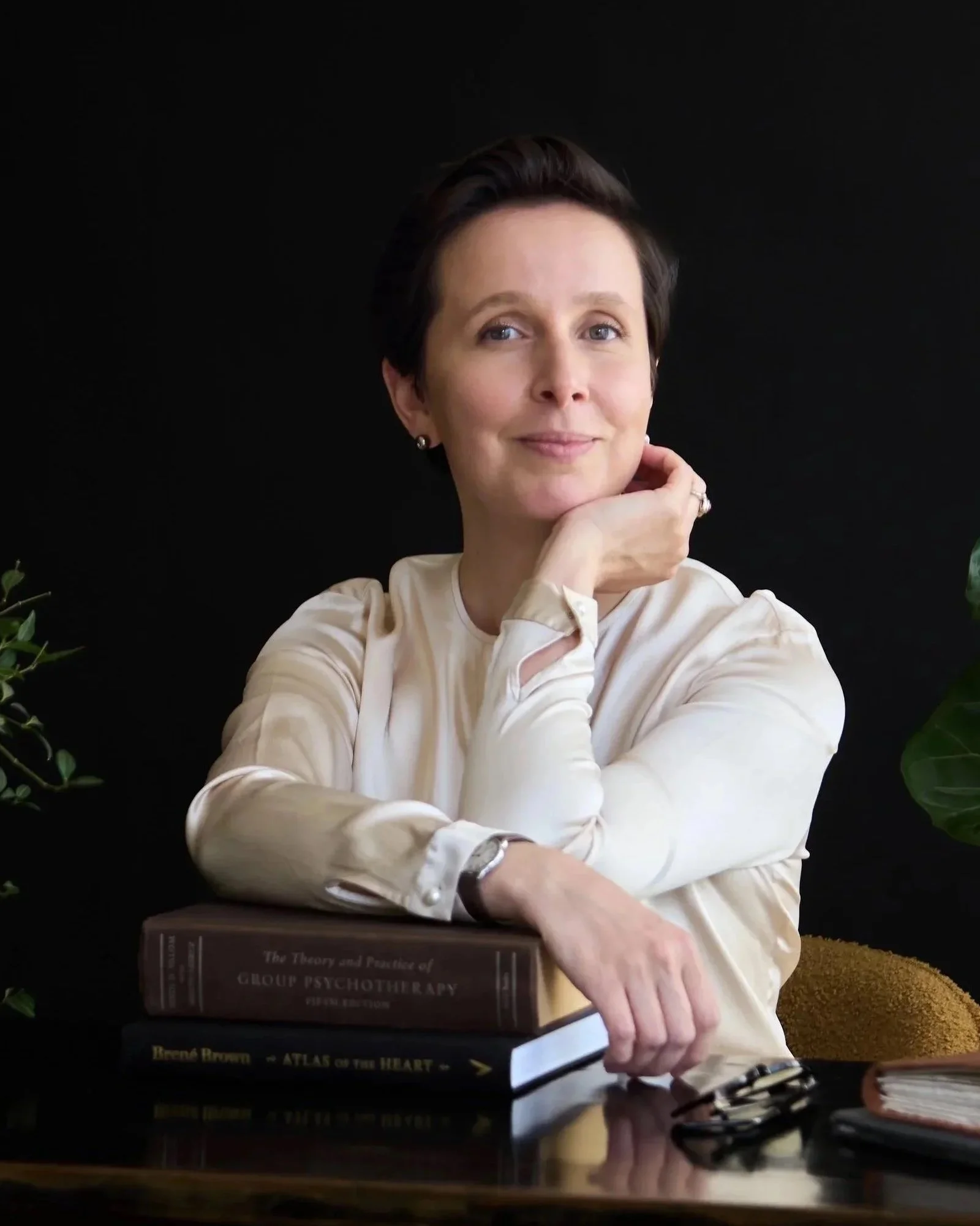 The woman is a psychologist working with diplomatic spouses & partners helping them navigate diplomatic postings and reintegration upon return home. She helps them through individual therapy, support groups, workshops, lectures and masterclasses.