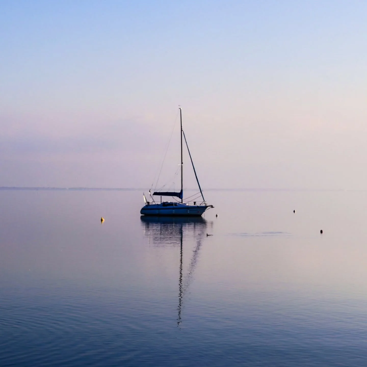 Peace. 
No wonder this lake is often called the Hungarian Sea &mdash; in the right weather, its sheer size creates a perfect coastal horizon. 🌊

On the occasion of a wedding photoshoot, I visited Tihany and Balatonalm&aacute;di by Lake Balaton this 