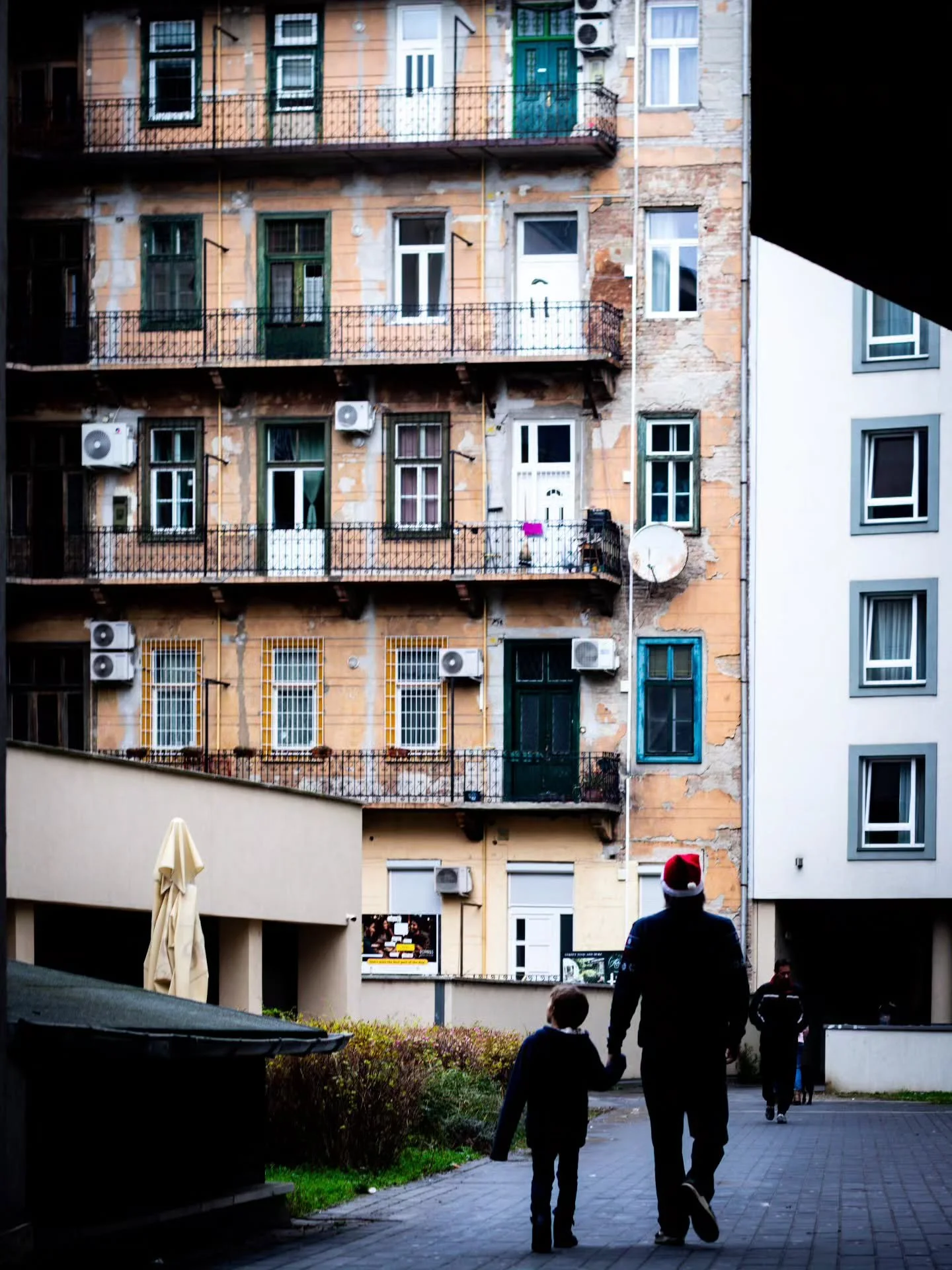 Two of the three people I love most in the world (simply because my other son wasn&rsquo;t with us).

Here, where old and new meet&mdash;in a neighbourhood around the Semmelweis Clinics, Budapest, Hungary&mdash;where I once held my mother&rsquo;s han