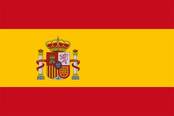 The flag of Spain with horizontal red and yellow stripes and the national coat of arms in the center.