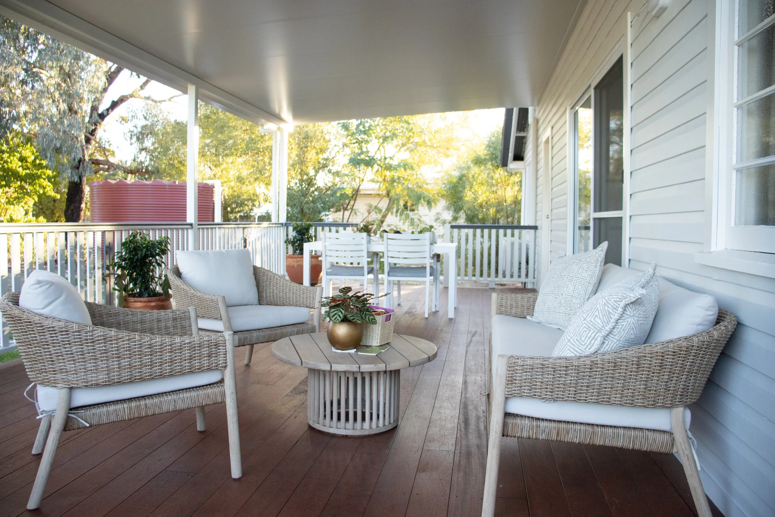 A merbau timber deck with outdoor furniture.