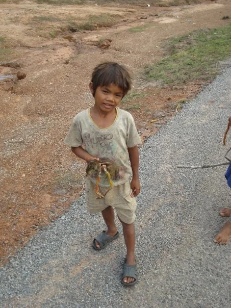 kid with slingshot.jpg