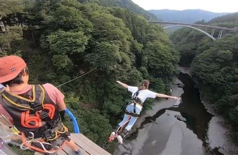 Bungee jump above a river gorge on the Chichibu adventure tour