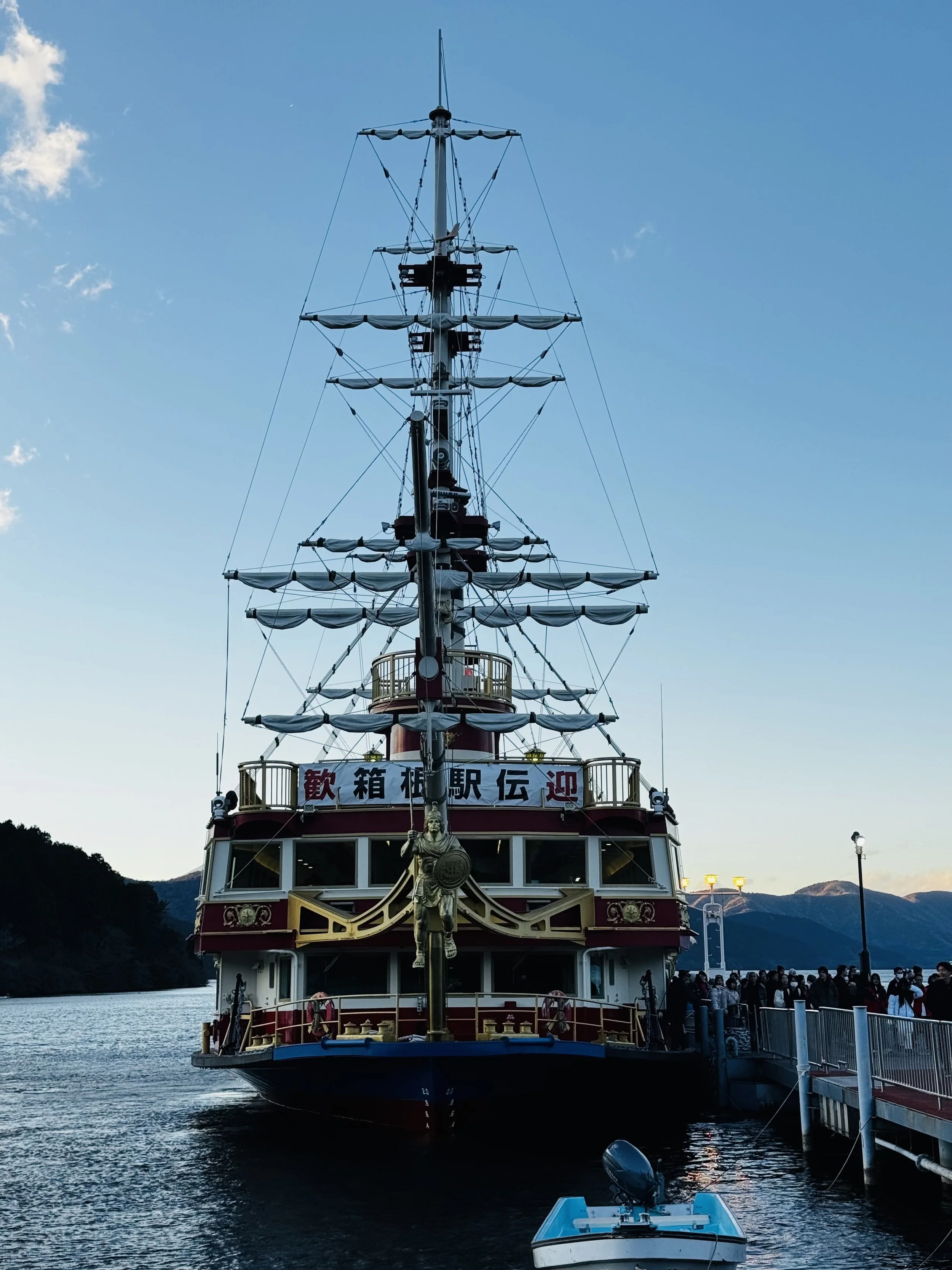 Lake Ashi sightseeing pirate ship moored near Hakone Port under clear blue sky
