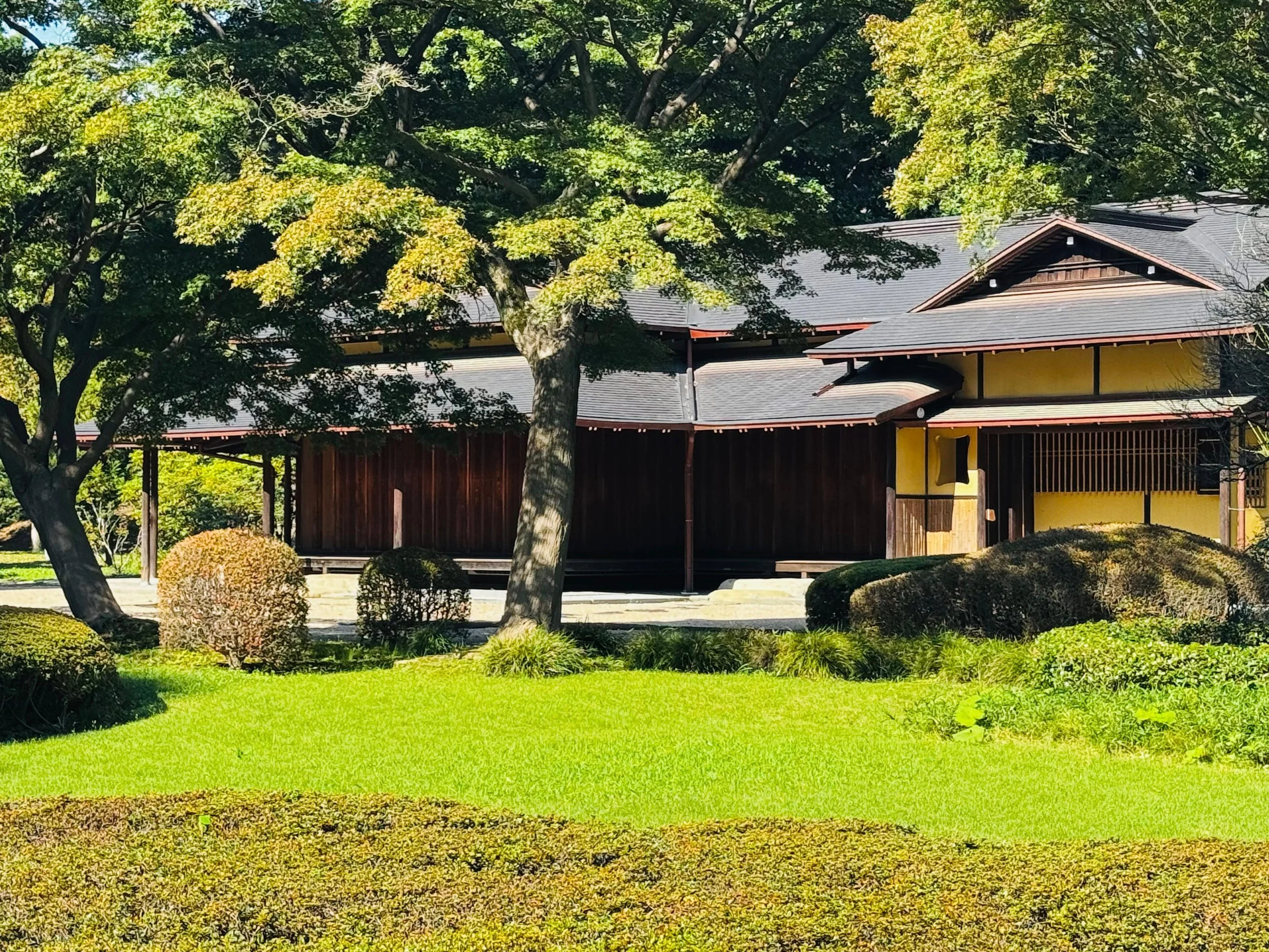 East Gardens of the Imperial Palace in Tokyo with lawn and Tea House